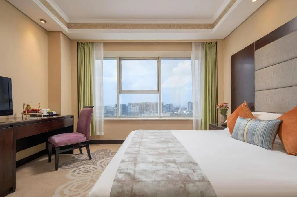 Bed in Yiwu Yimei Plaza Hotel