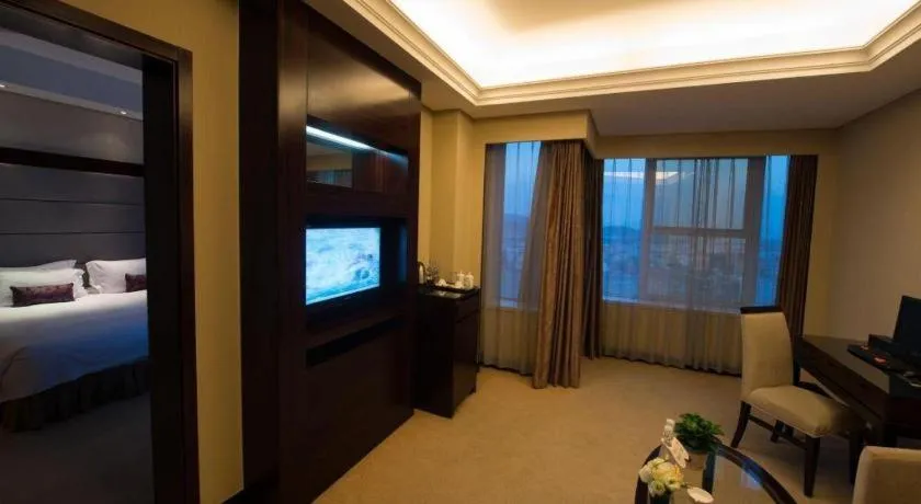 Bed in Yiwu Yimei Plaza Hotel