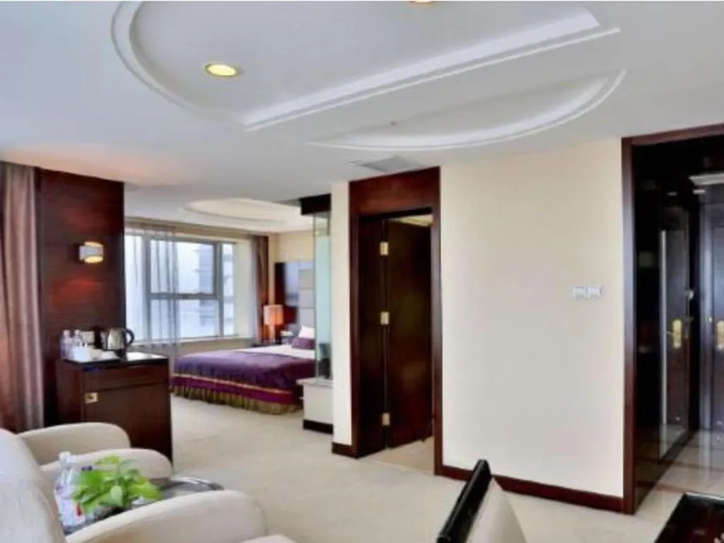 Bed in Yiwu Yimei Plaza Hotel