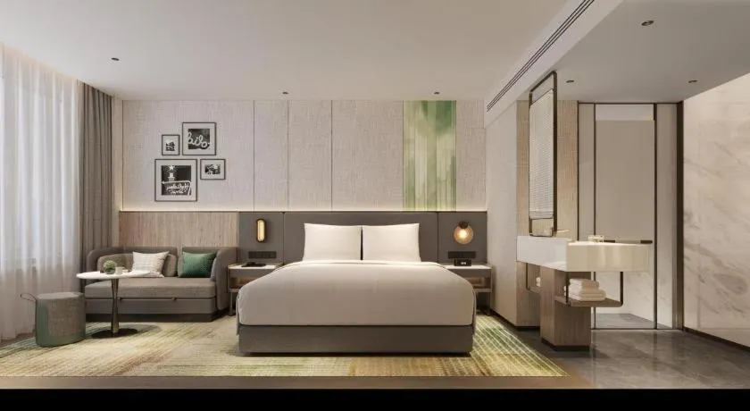 Bed in Yiwu Yimei Plaza Hotel