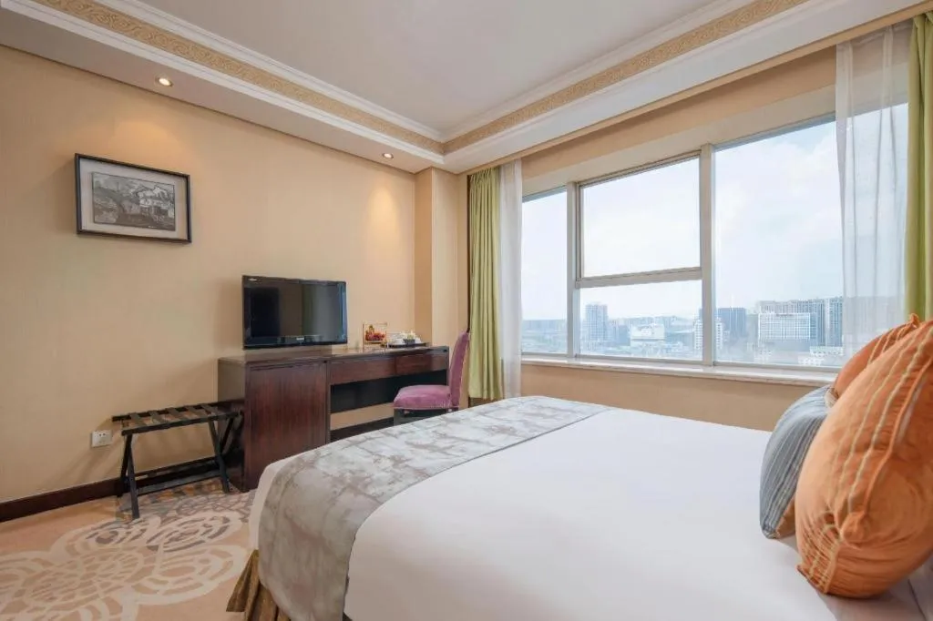 Bed in Yiwu Yimei Plaza Hotel