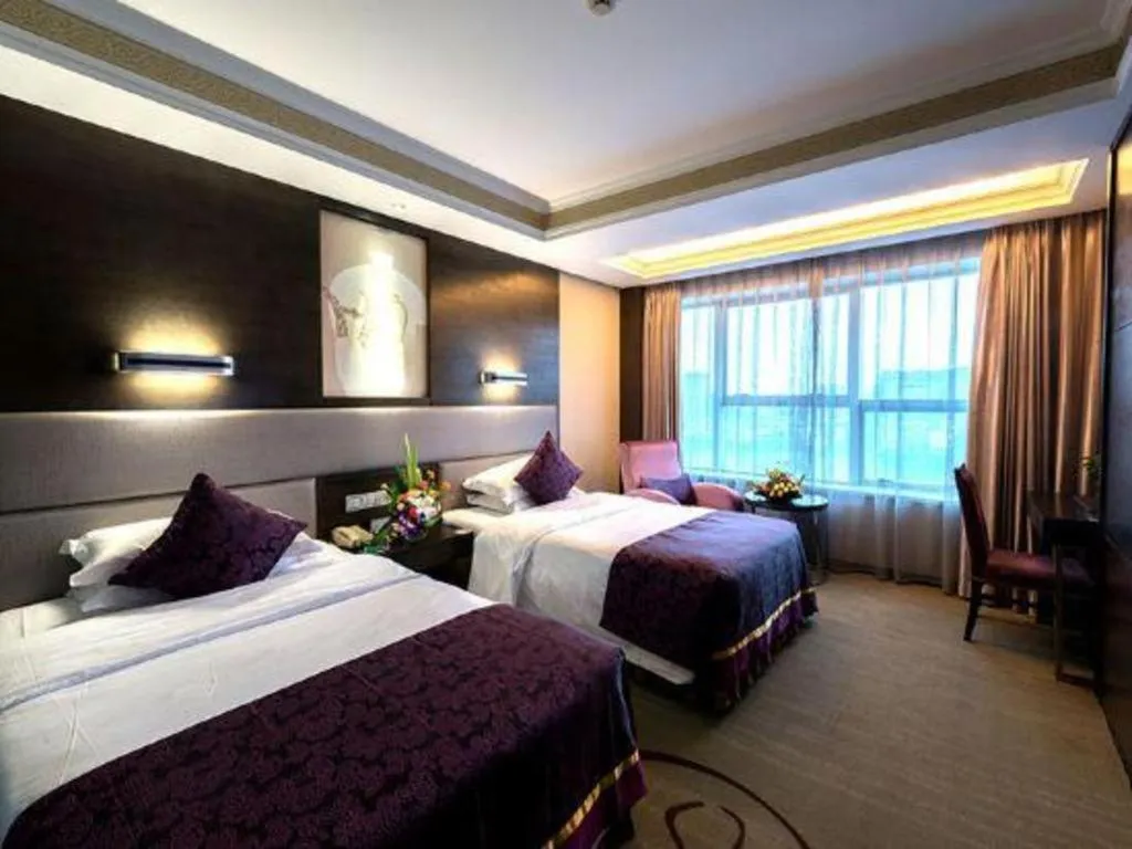 Bed in Yiwu Yimei Plaza Hotel