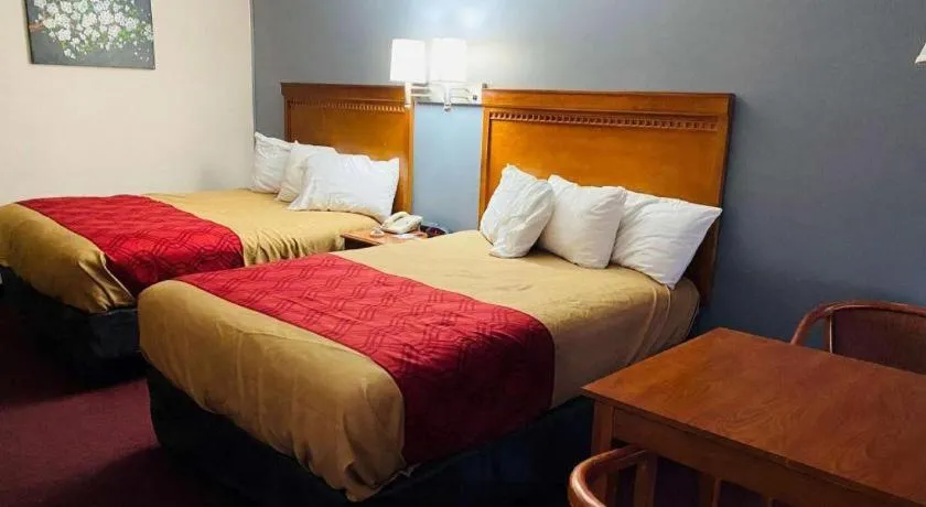 Bed in Baymont by Wyndham Lake George