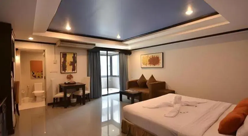 Bed in The Heritage Sathorn Suite Hotel Bed in The Heritage Sathorn Suite Hotel