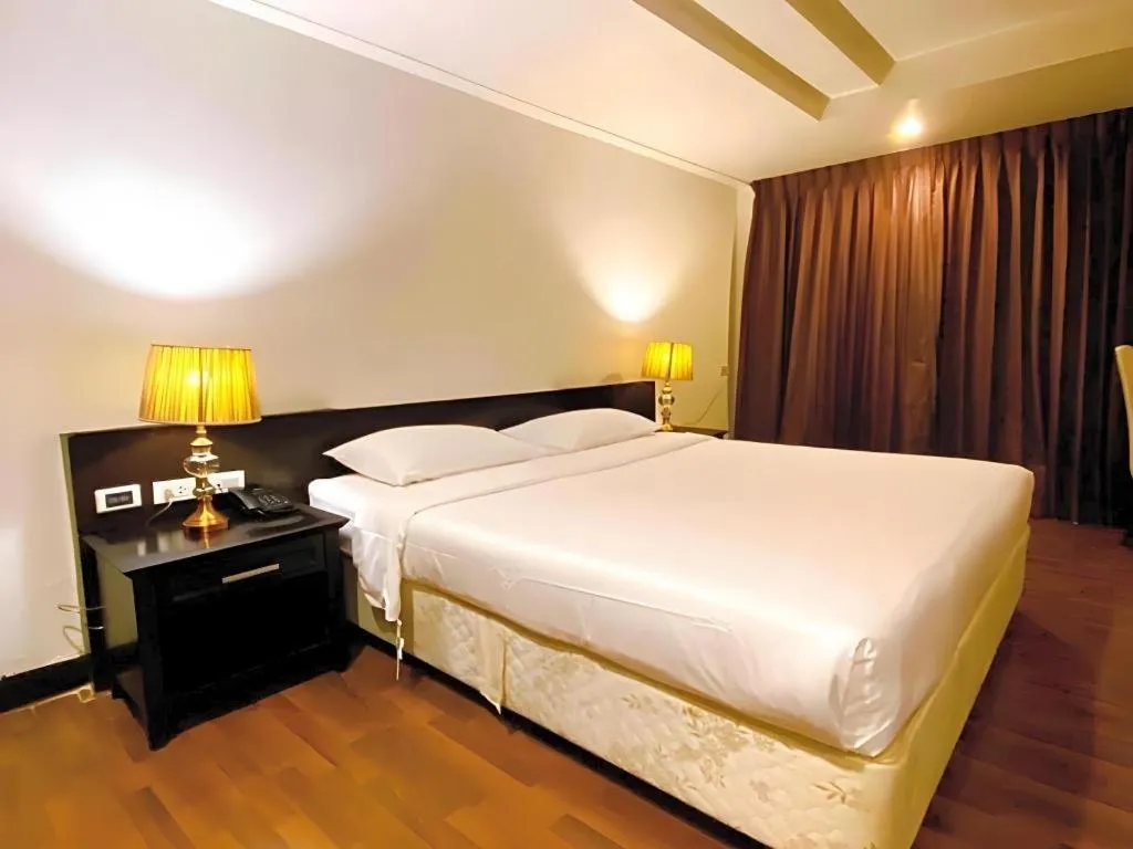 Bed in The Heritage Sathorn Suite Hotel