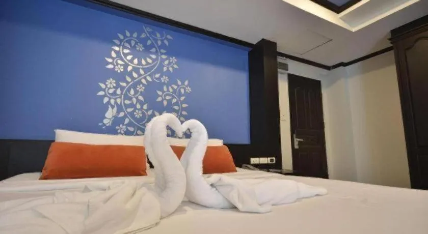 Bed in The Heritage Sathorn Suite Hotel