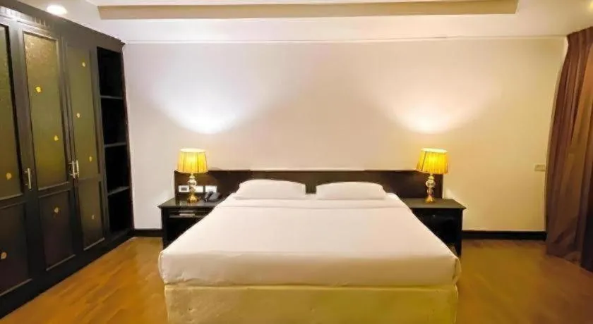 Bed in The Heritage Sathorn Suite Hotel