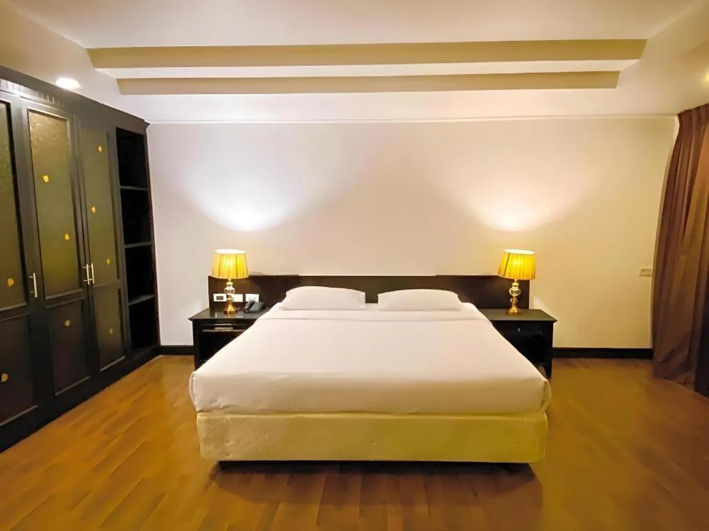 Bed in The Heritage Sathorn Suite Hotel