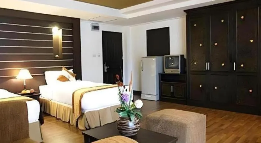 Bed in The Heritage Sathorn Suite Hotel