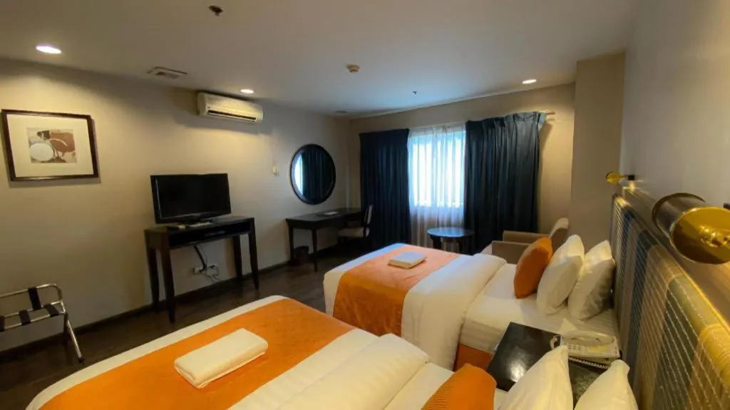 Bed in Baguio Burnham Suites Hotel