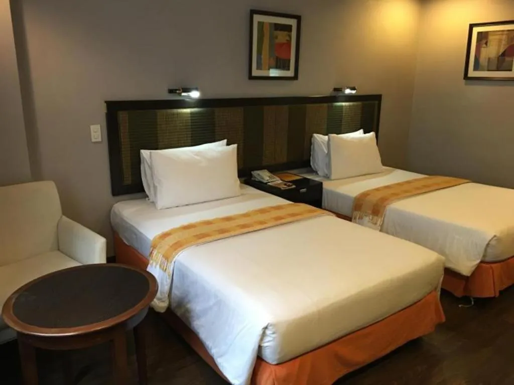 Bed in Baguio Burnham Suites Hotel