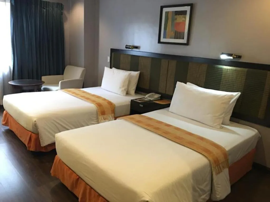 Bed in Baguio Burnham Suites Hotel