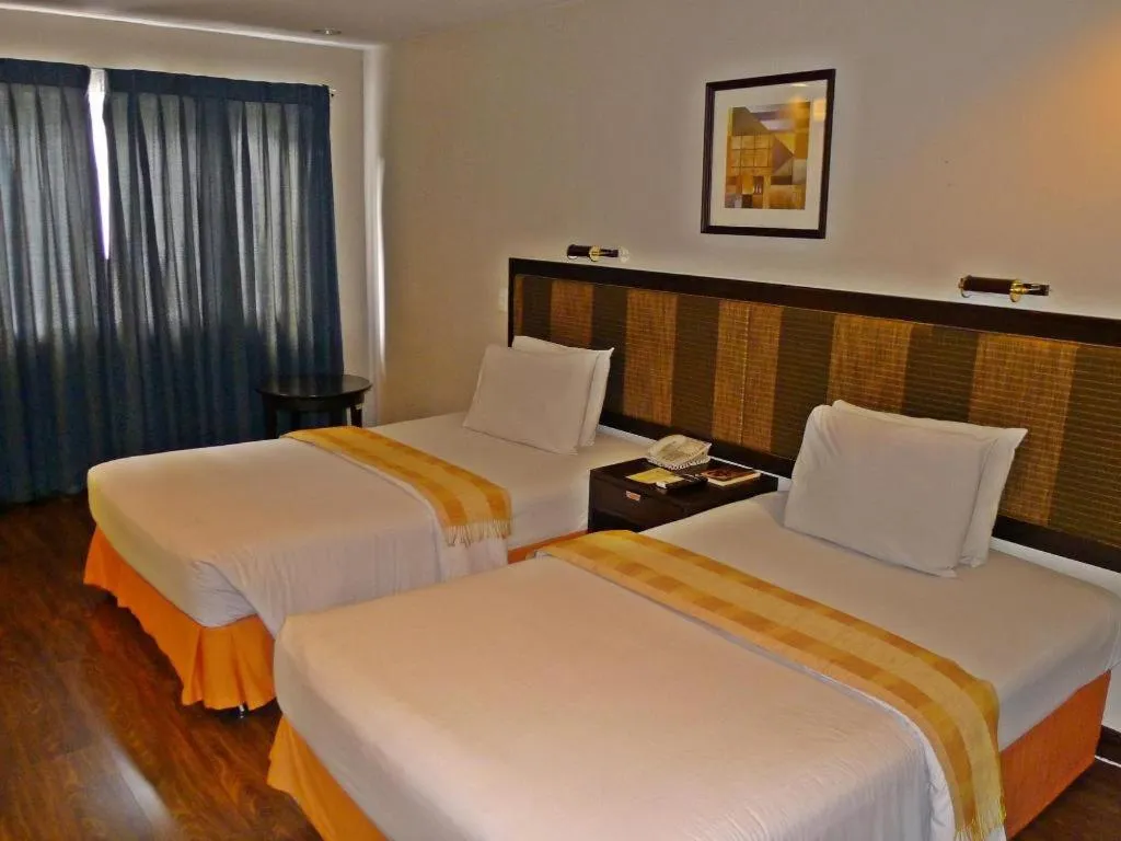 Bed in Baguio Burnham Suites Hotel