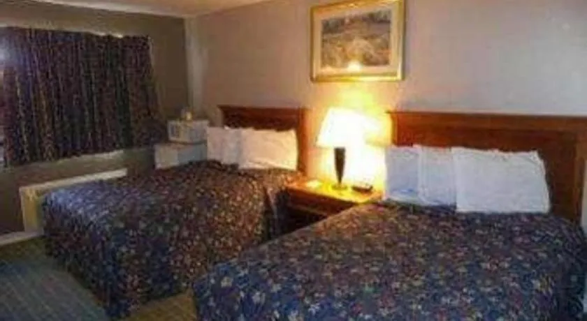 Bed in Days Inn by Wyndham West Branch Iowa City Area