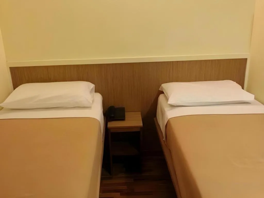 Bed in Arianna Hotel