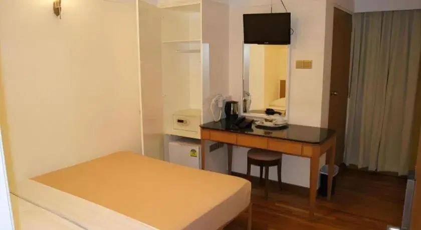 Bed in Arianna Hotel Bed in Arianna Hotel