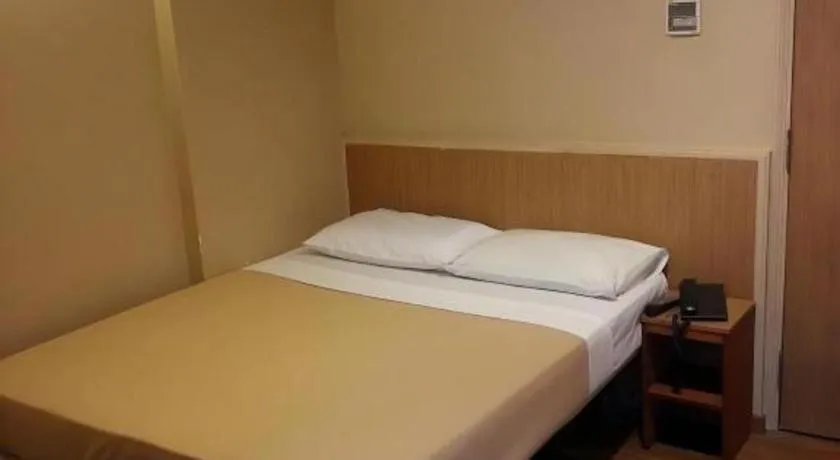 Bed in Arianna Hotel