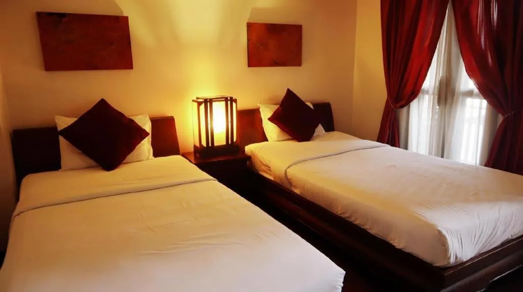 Bed in Anoma Boutique House