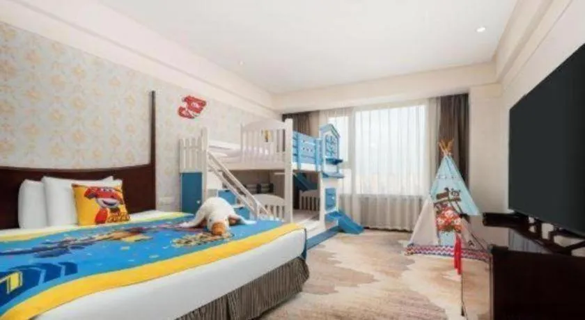 Bed in Grand New Century Hotel Binhai Tianjin