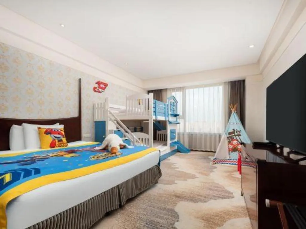 Bed in Grand New Century Hotel Binhai Tianjin