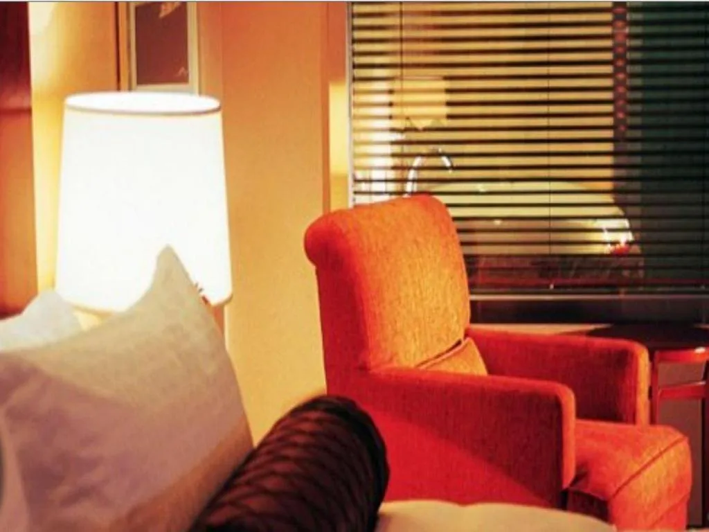 Bed in Grand New Century Hotel Binhai Tianjin