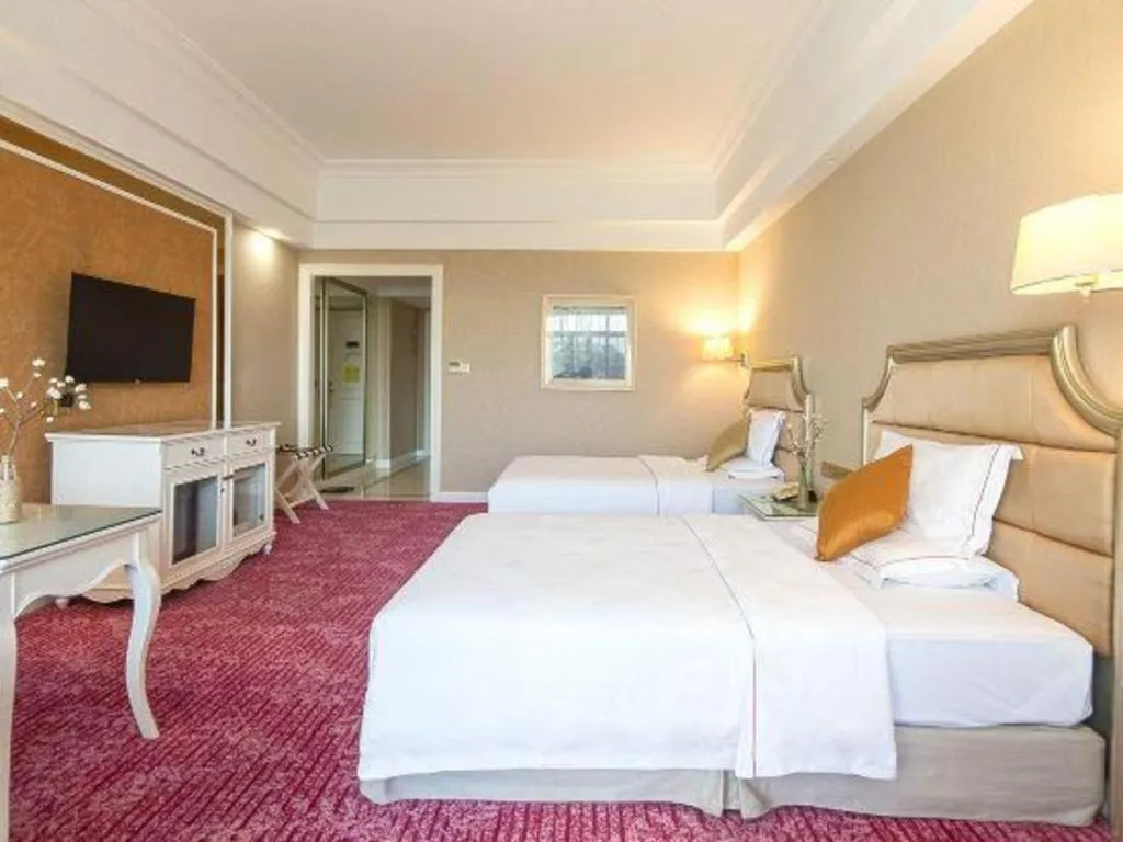 Bed in Country Garden Phoenix Hotel Changsha