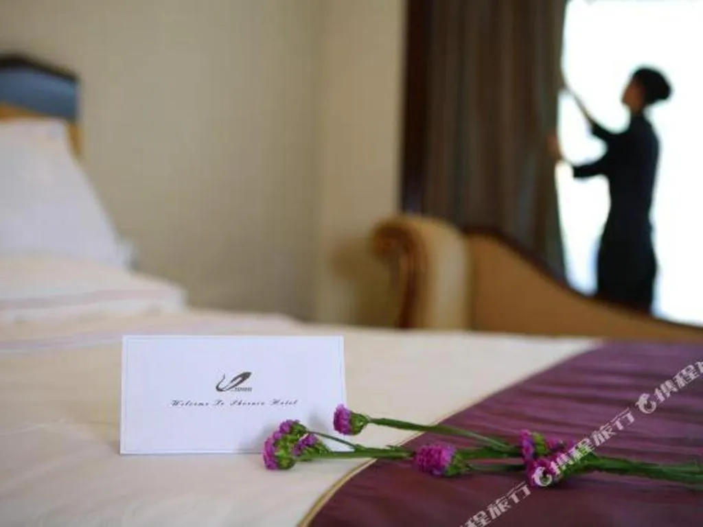 Bed in Country Garden Phoenix Hotel Changsha