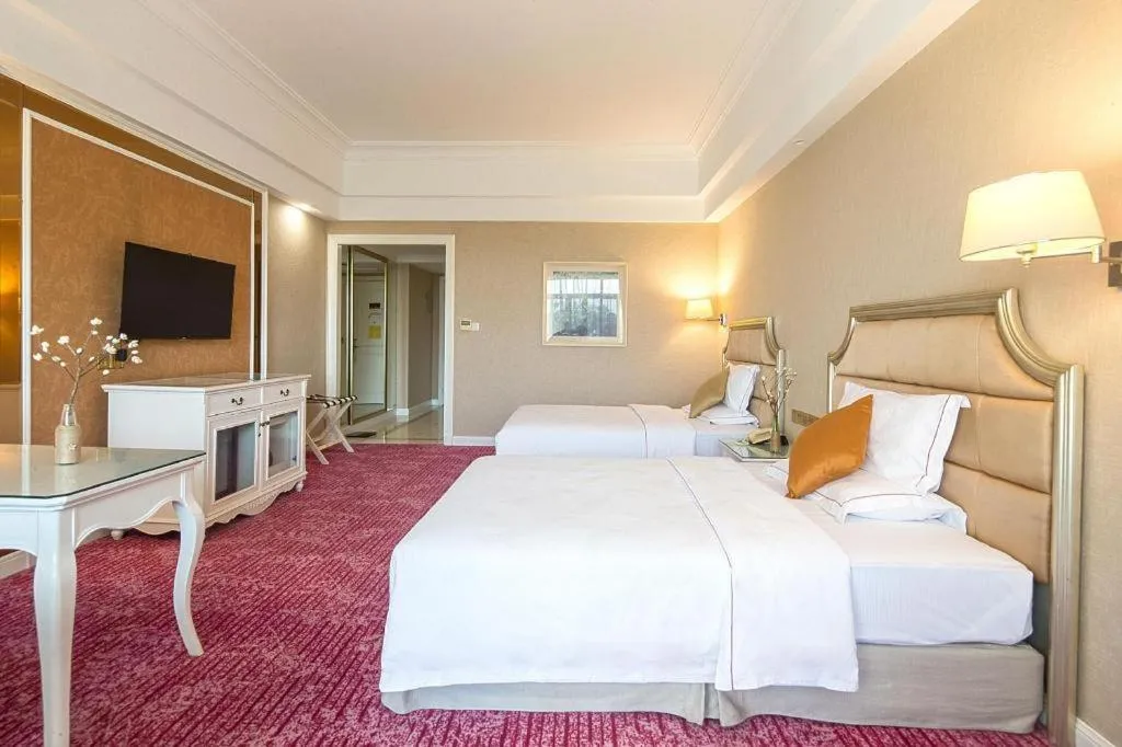 Bed in Country Garden Phoenix Hotel Changsha