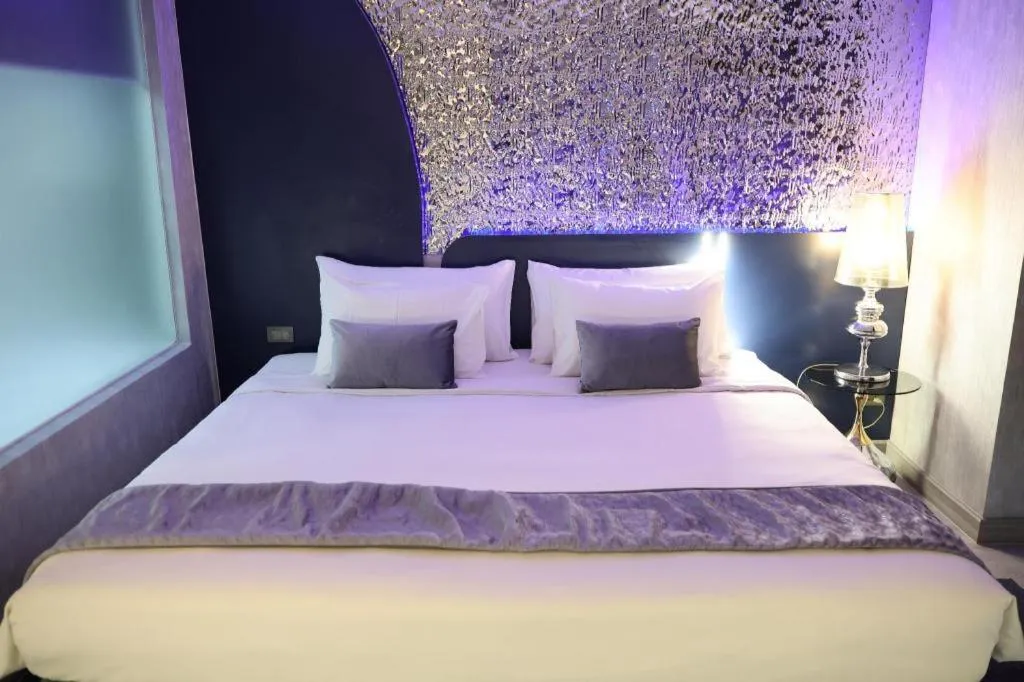 Bed in Glacier Hotel Khon Kaen