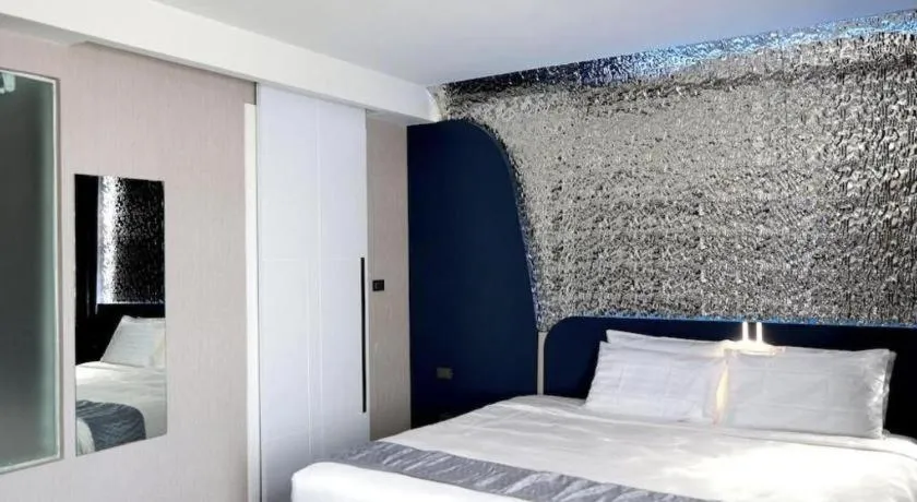 Bed in Glacier Hotel Khon Kaen