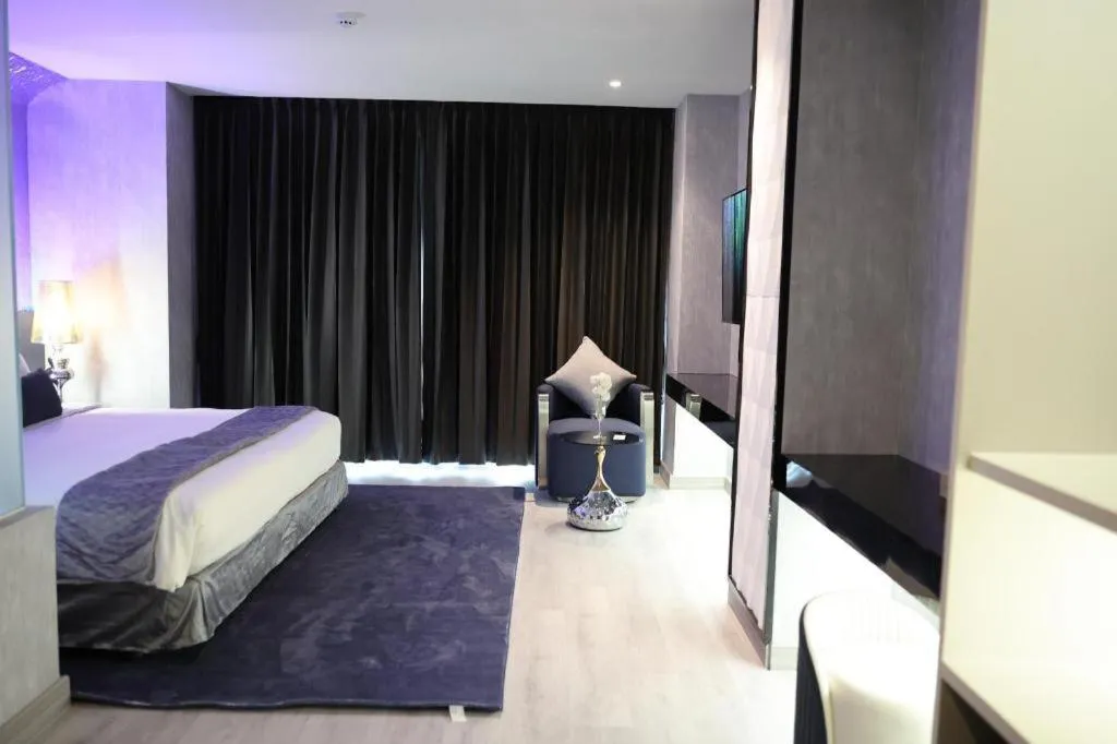 Bed in Glacier Hotel Khon Kaen