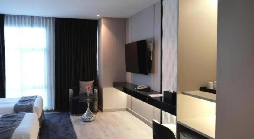 Bed in Glacier Hotel Khon Kaen