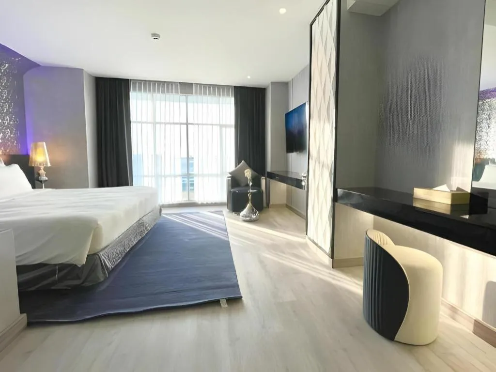 Bed in Glacier Hotel Khon Kaen