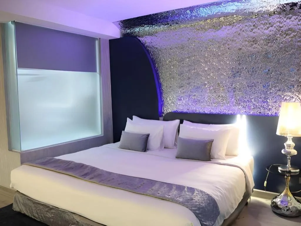 Bed in Glacier Hotel Khon Kaen