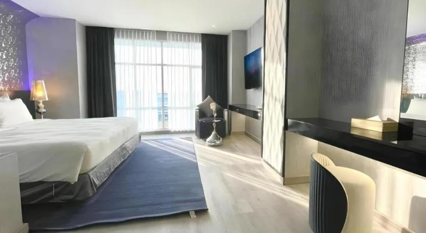 Bed in Glacier Hotel Khon Kaen