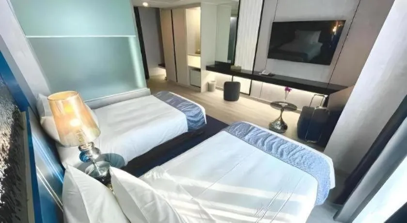 Bed in Glacier Hotel Khon Kaen