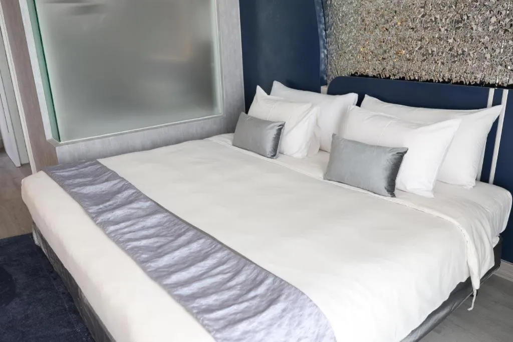 Bed in Glacier Hotel Khon Kaen