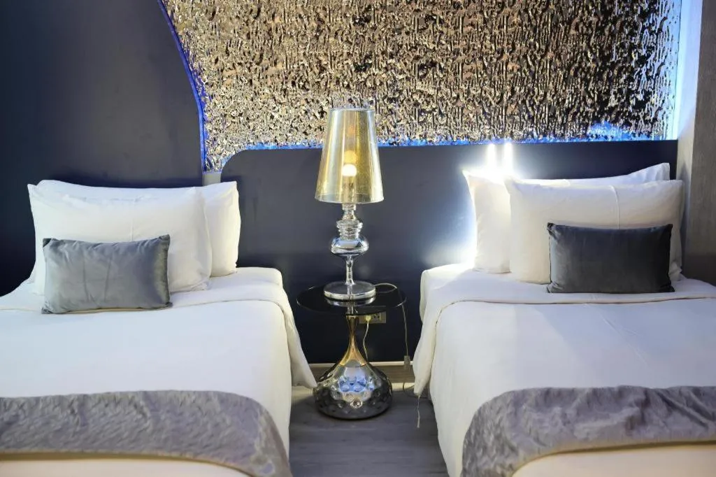 Bed in Glacier Hotel Khon Kaen