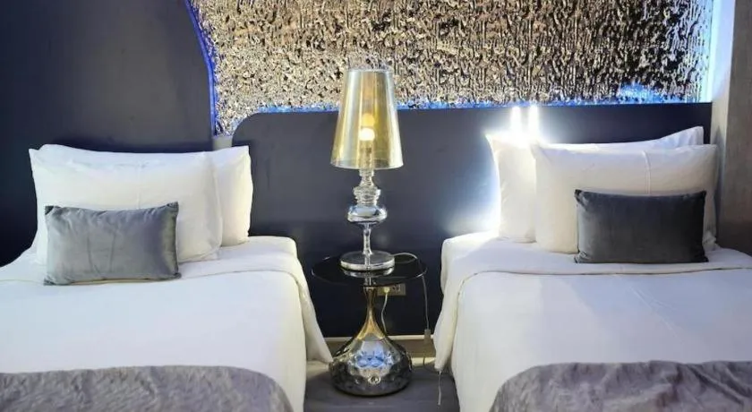 Bed in Glacier Hotel Khon Kaen