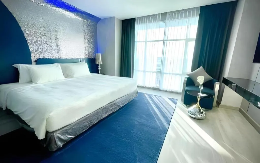 Bed in Glacier Hotel Khon Kaen