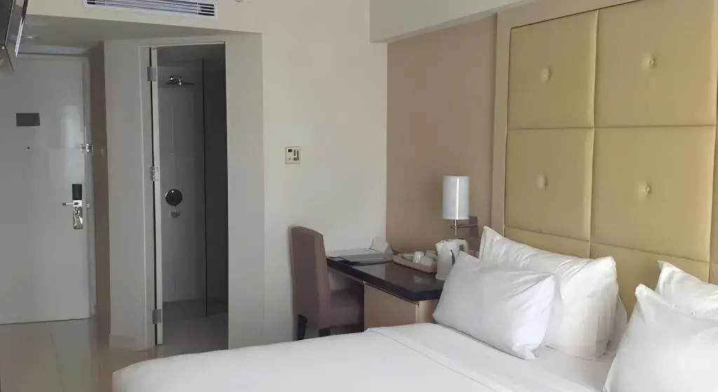 Bed in Hotel Santika Makassar Bed in Hotel Santika Makassar