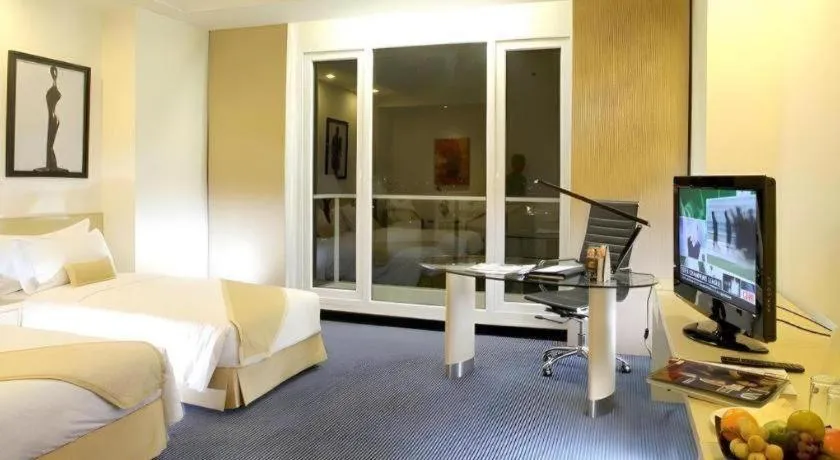 Bed in Sintesa Peninsula Hotel