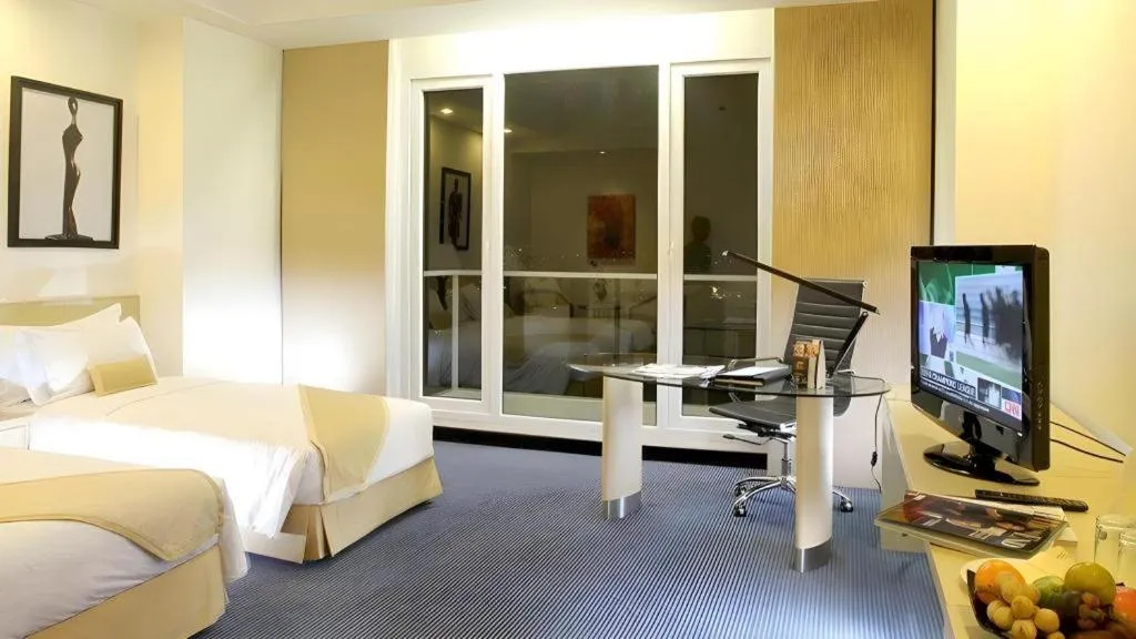 Bed in Sintesa Peninsula Hotel