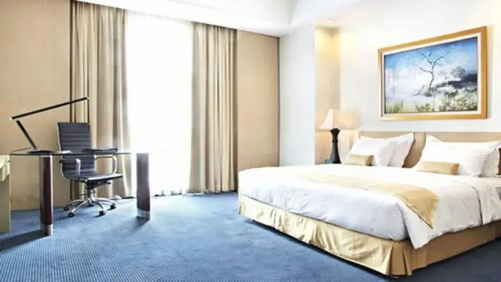 Bed in Sintesa Peninsula Hotel Bed in Sintesa Peninsula Hotel