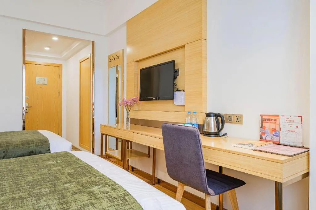 Bed in GreenTree Inn Shanghai Jingan Railway Station Xinzha Road Business Hotel