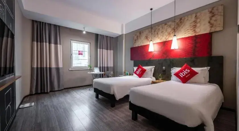 Bed in Ibis Xiamen Railway Station Hotel Bed in Ibis Xiamen Railway Station Hotel
