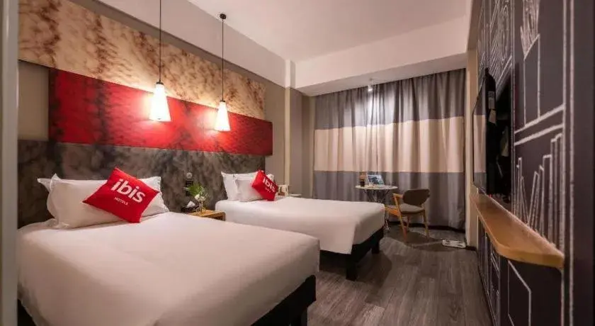 Bed in Ibis Xiamen Railway Station Hotel Bed in Ibis Xiamen Railway Station Hotel