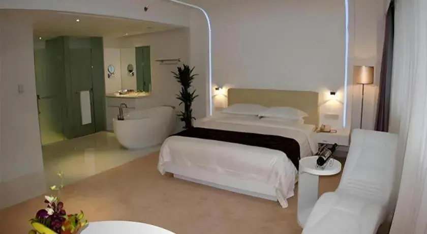 Bed in Ramada Plaza by Wyndham Hangzhou Riverside Bed in Ramada Plaza by Wyndham Hangzhou Riverside