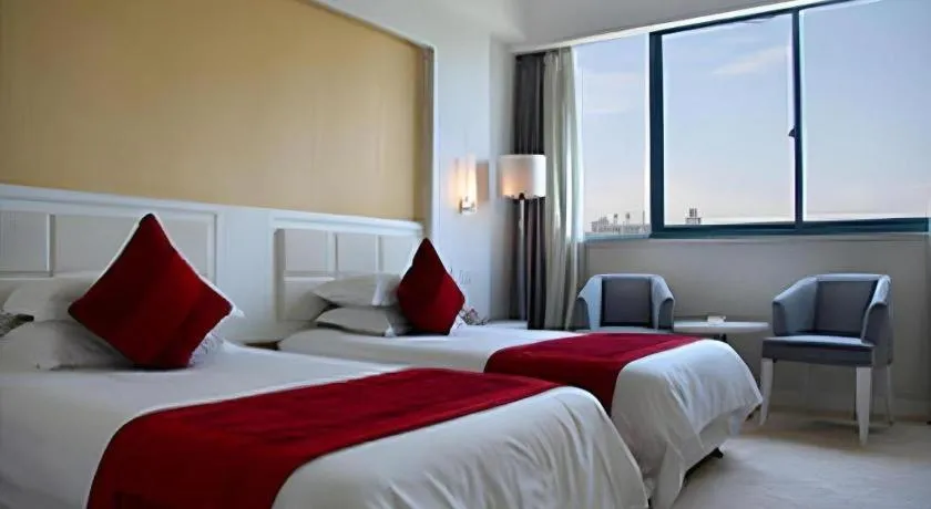 Bed in Ramada Plaza by Wyndham Hangzhou Riverside
