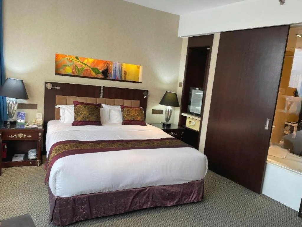 Bed in Wuhan Asia Hotel